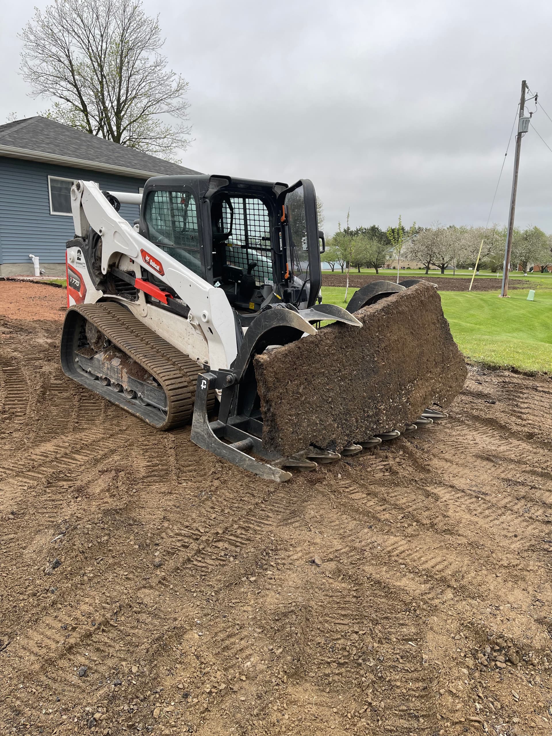 Asphalt Driveway Removal and Site Prep in Mosinee image