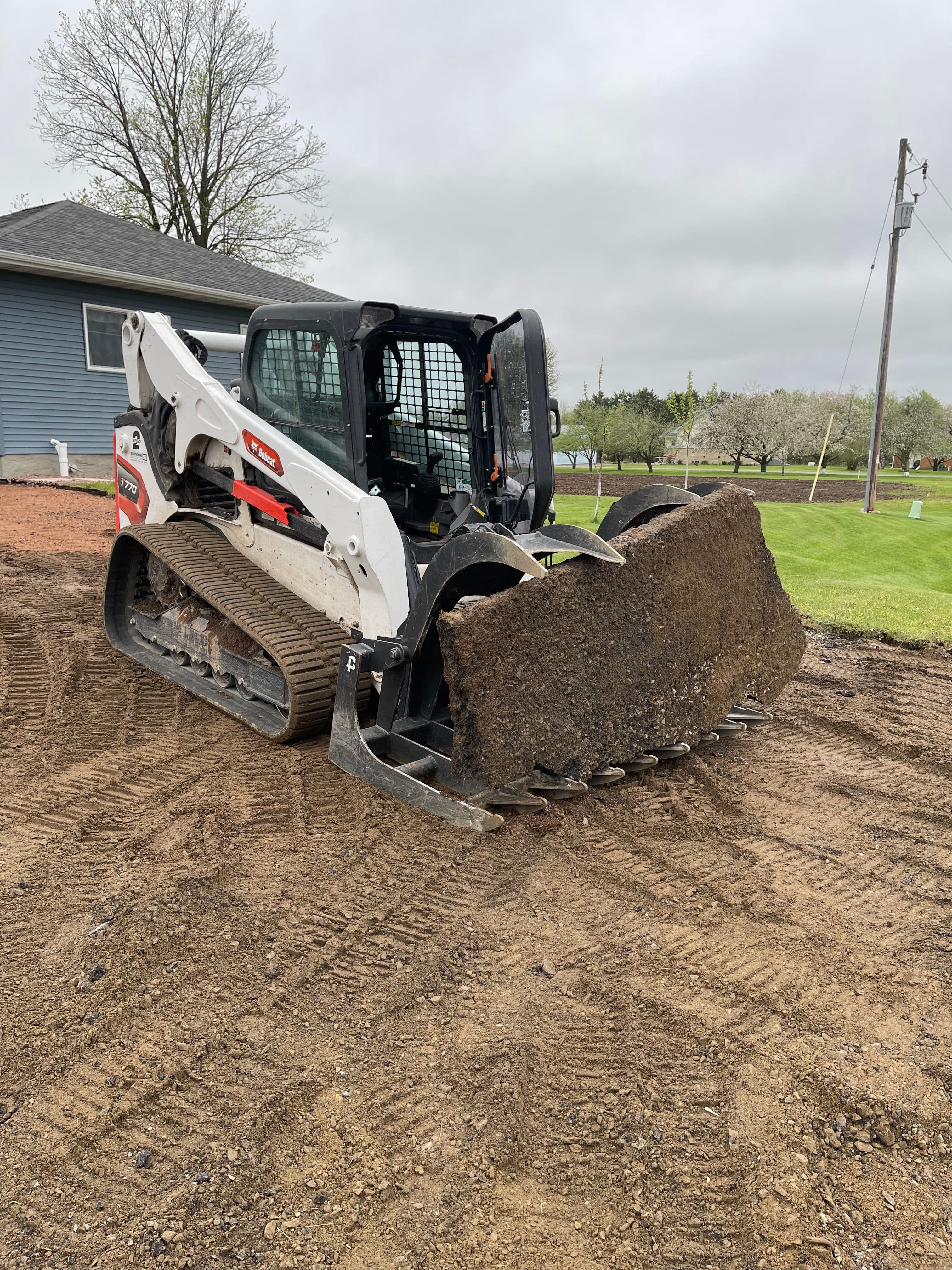 Project Asphalt Driveway Removal and Site Prep in Mosinee image