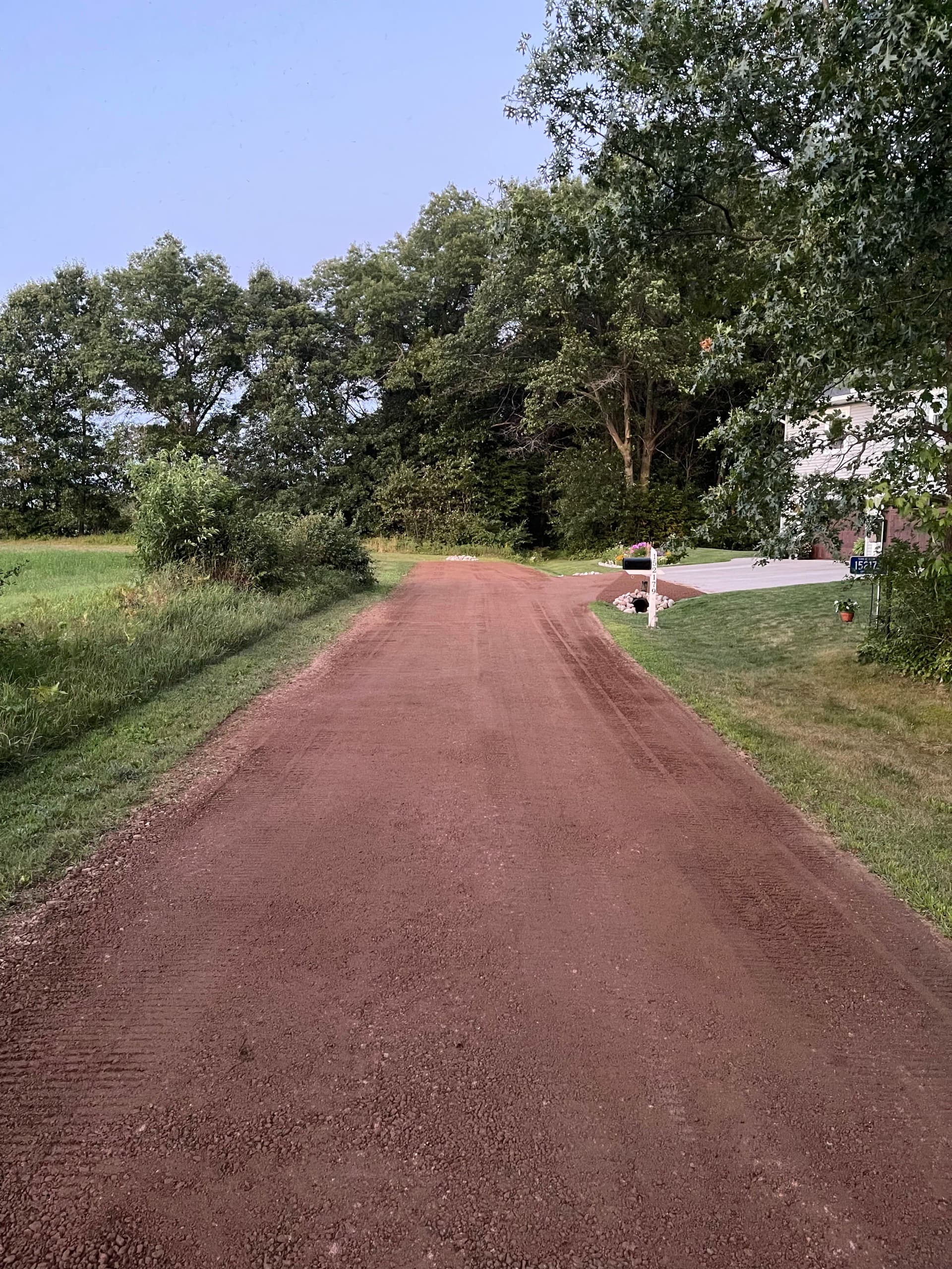 Red Granite Gravel Driveway Installed on Lake DuBay in Mosinee image