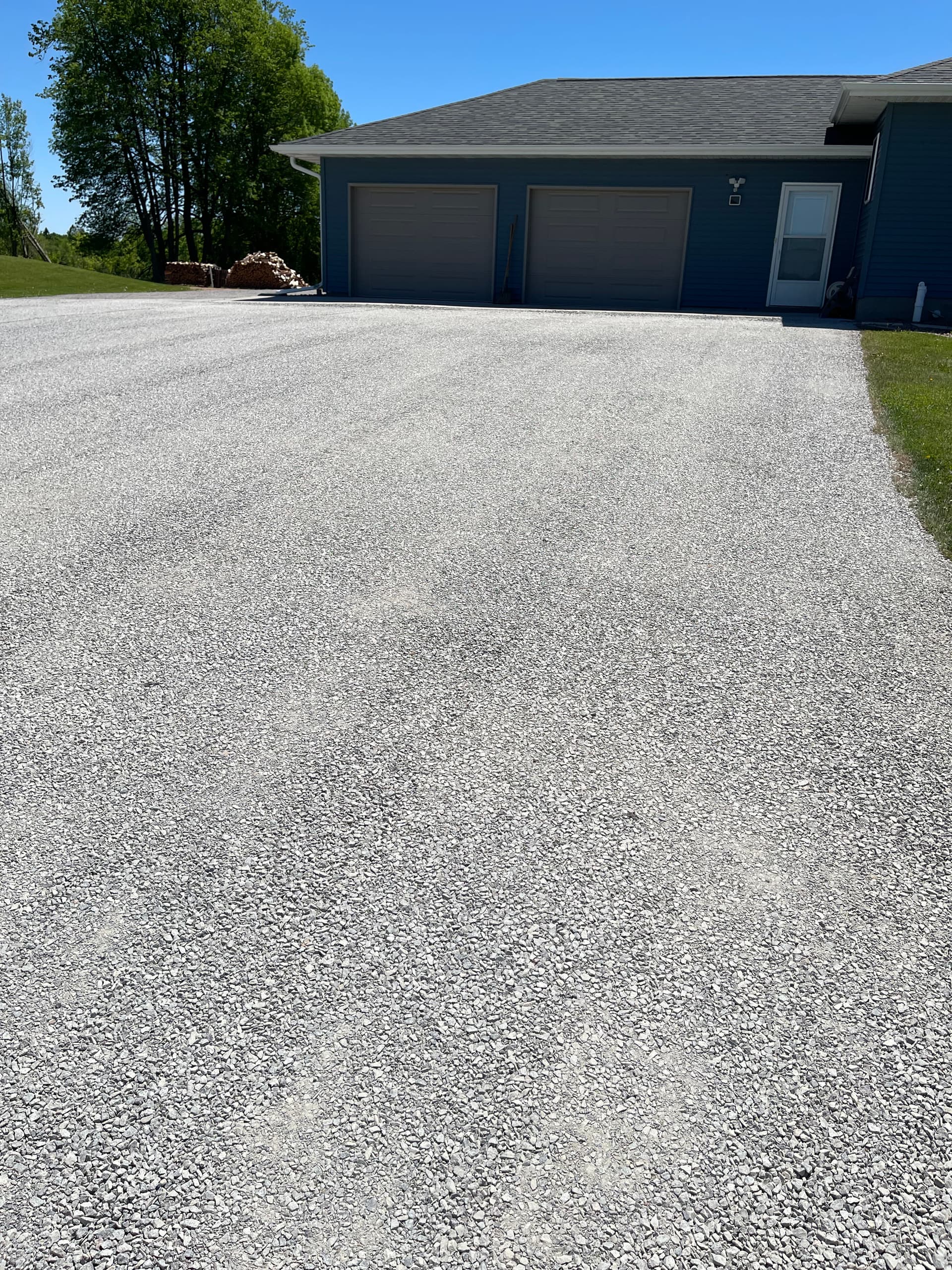 Gallery photos for Fresh Gravel Driveway Gets a Clean Finish in Mosinee: Image #1