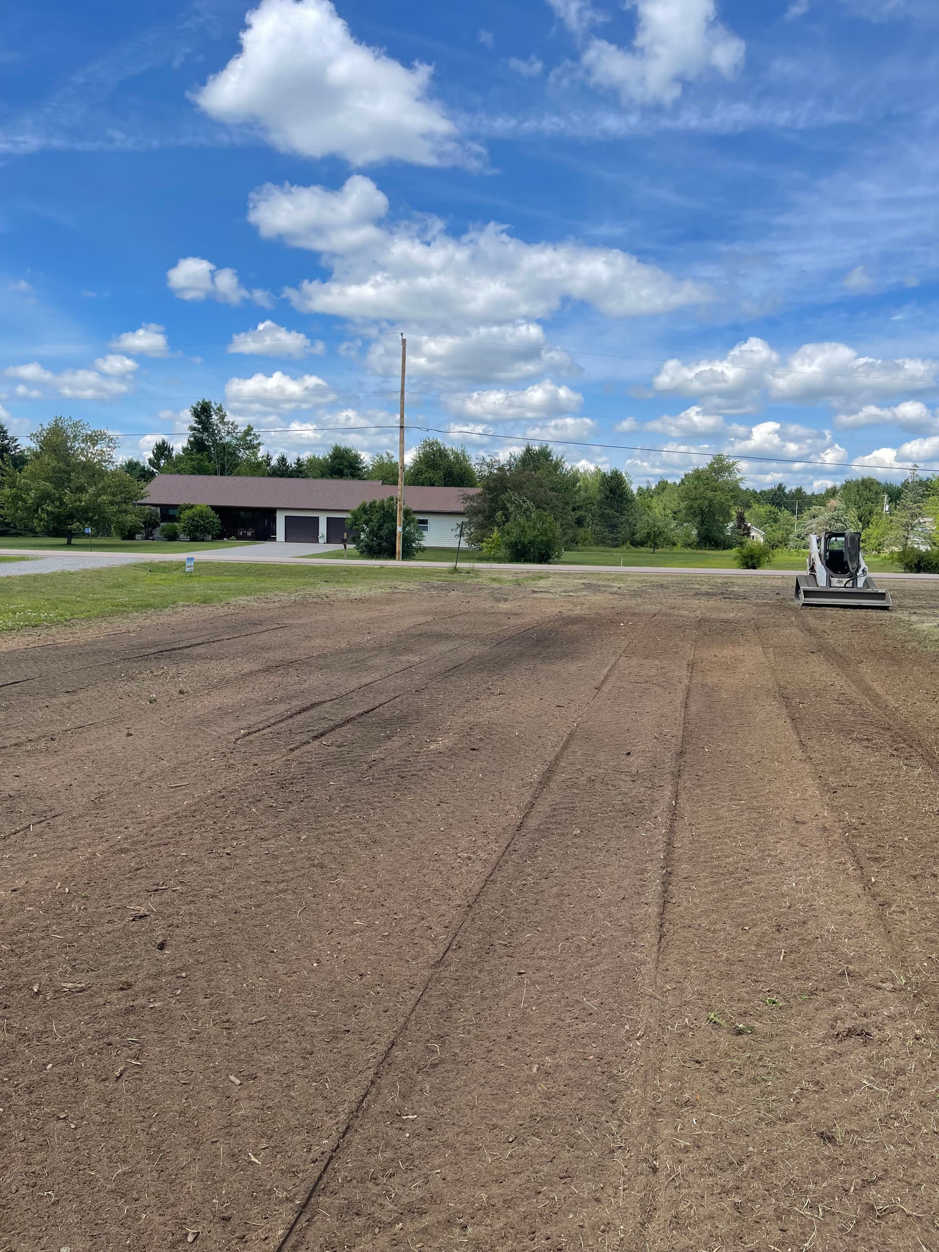 Gallery photos for Storm Damage Lawn Cleanup and Grading in Ringle: Image #1